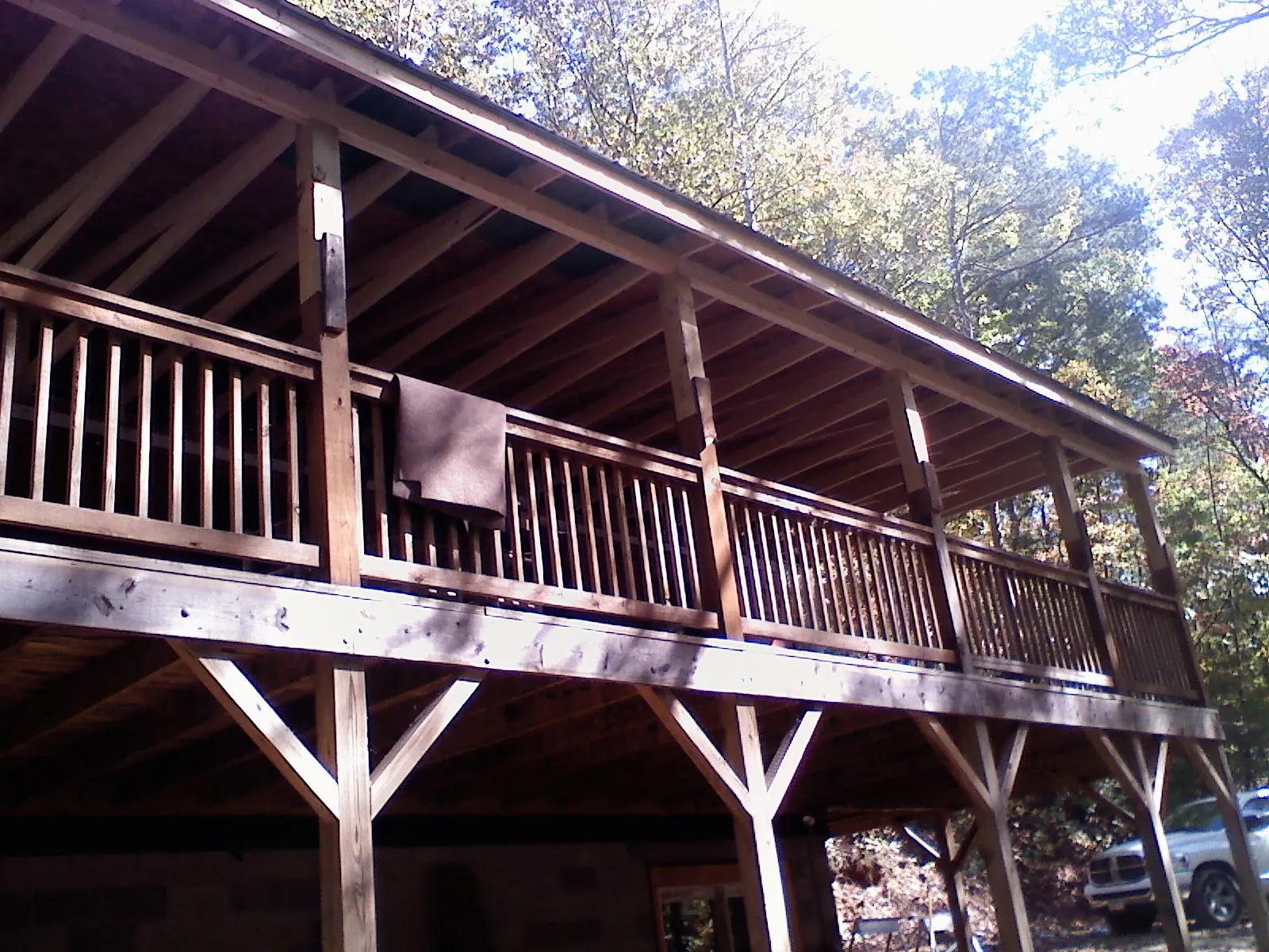 Timber framing under a new elevated porch and deck — Roof Leak Repair in Culpeper by Roofing Brothers
